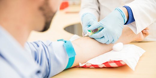 Pov of patient getting a blood test